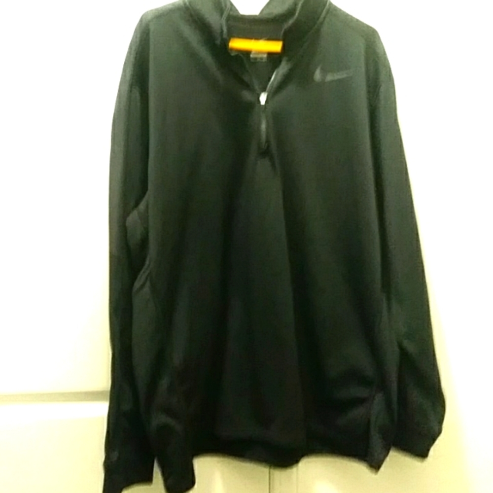 Black sweatshirt by Nike with decoration on the sleeve
